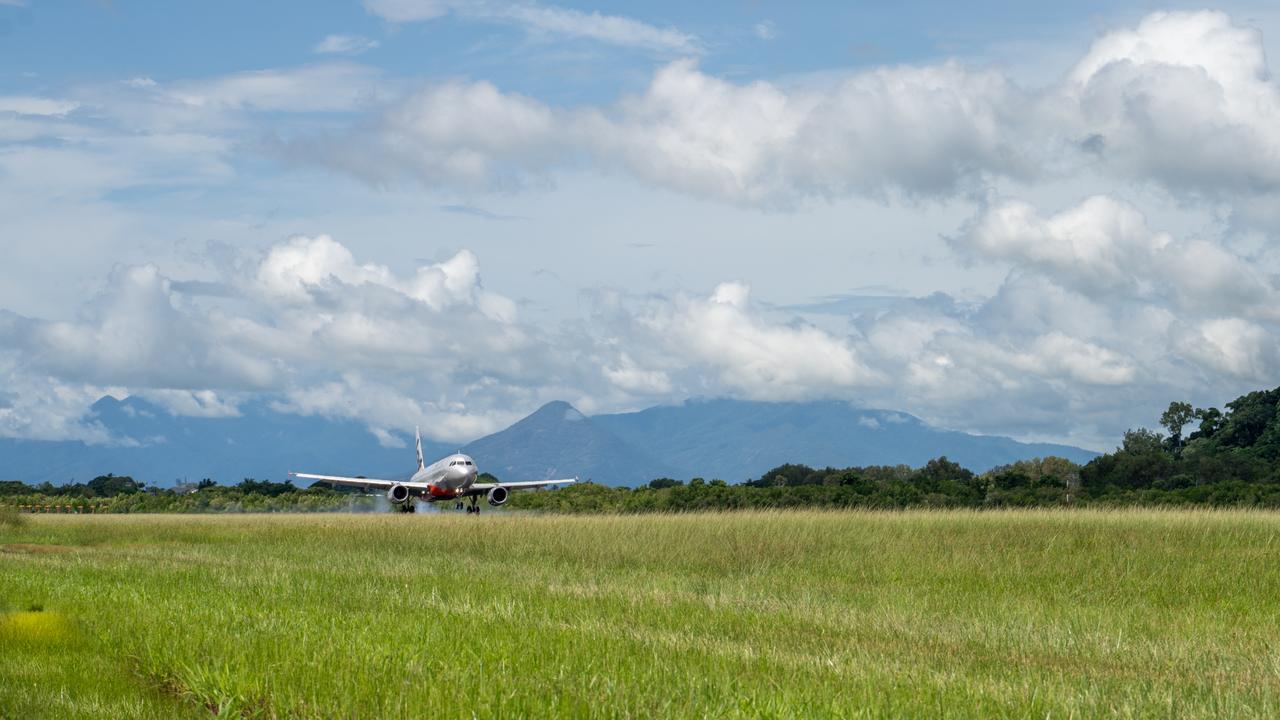 JQ136 landed at Cairns Airport at 10.40am on Wednesday. Picture: Bang Media