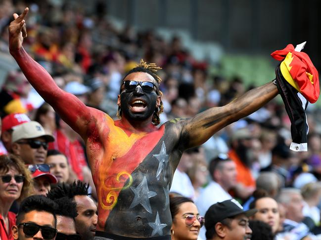 A PNG fan watches the Rugby League World Cup quarter finals match between Papua New Guinea and England at AAMI Park in Melbourne, Sunday, November 19, 2017. (AAP Image/Joe Castro) NO ARCHIVING, EDITORIAL USE ONLY