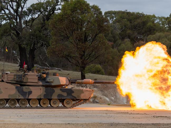 The Australian Army M1A1 Abrams Main Battle Tank fires its 120mm cannon during a live-fire serial for the Coral Balmoral Cup 2024 at the Puckapunyal Military Area, Victoria. *** Local Caption *** From 15 to 19 April 2024, the Royal Australian Armoured Corps hosted the Coral-Balmoral Cup 2024 at the Puckapunyal Military Area, Victoria.  Coordinated by the School of Armour, the competition tested tank and cavalry crews from the Australian Army and United States Marine Corps.  It consisted of a variety of challenges to find the best team from each armoured crew and the best unit in the competition. The competition pays homage to the historic Battle of Coral-Balmoral, which highlighted the effectiveness of combined arms tactics.