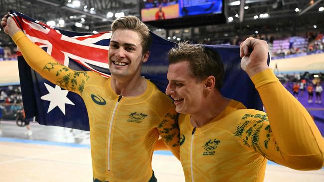 Silver medallist Matthew Richardson, right, and bronze medallist Matthew Glaetzer after the keirin event. Picture: AFP