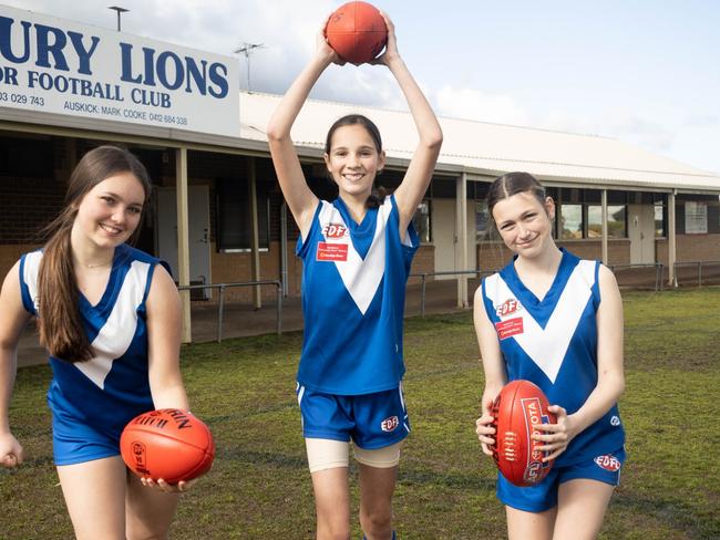 Footballers from the Sunbury Lions Football Netball Club. L-R Emma, Kalea and Kim.