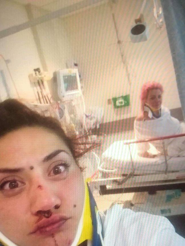 Hazel Wildman and Faeda Hunter take selfies in hospital after being involved in a head-on crash at Berkshire Park on Sunday.