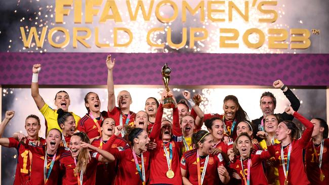 Spain lift the World Cup trophy. Photo by FRANCK FIFE / AFP