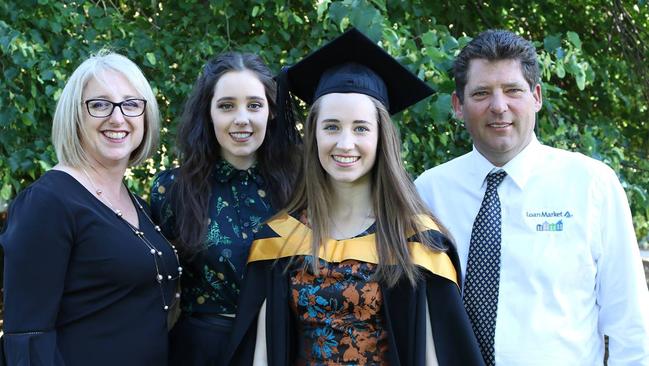 Shark attack victim Justine Barwick, left, of Burnie with her family.