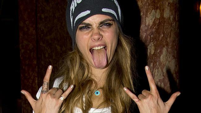 Cara Delevingne's tongue is almost as famous as Miley's. Picture: Splash