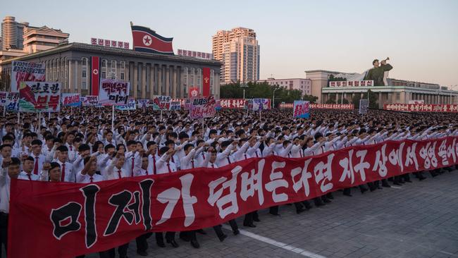 Students march during a mass anti-America rally on Kim Il-Sung square in Pyongyang on September 23. Picture: Kim Won-Jin