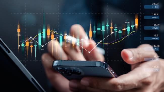 Businessmen investor think before buying stock market investment using smartphone to analyze trading data. investor analysis with stock exchange graph on screen. Financial stock market.