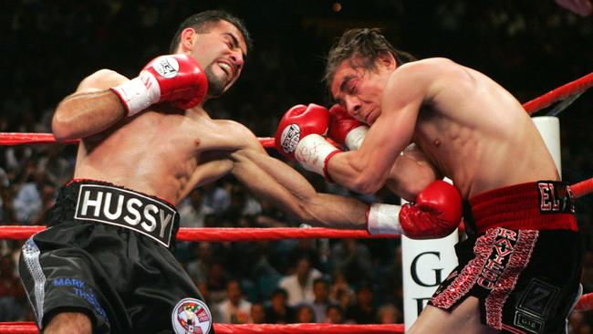 MARCH 19, 2005 : Boxer Hussein Hussein (L) lands a left to the body of Jorge Arce, as they trade punches in their WBC flyweight elimination bout at the MGM Grand Garden Arena in Las Vegas in 2005.