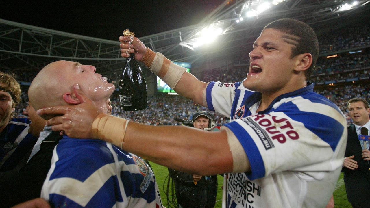 Mark O’Meley and Willie Mason after winning the Grand Final.