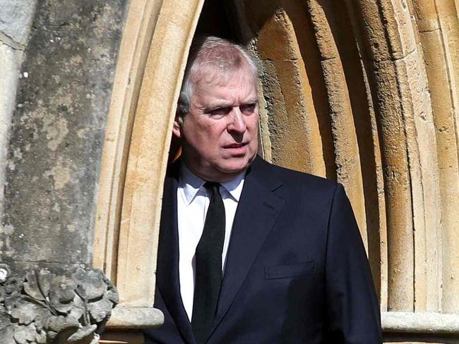 (FILES) In this file photo taken on April 11, 2021 Britain's Prince Andrew, Duke of York, attends Sunday service at the Royal Chapel of All Saints, at Royal Lodge, in Windsor, two days after the death of his father Britain's Prince Philip, Duke of Edinburgh. - The financial agreement obtained to avoid a trial in New York has not change anything: long described as Queen Elizabeth II's favourite son, Prince Andrew has become a pariah in the British royal family. The 61-year-old prince, accused of forced sex by American Virginia Giuffre in 2001, when she was a minor, "on loan" from the late financier Jeffrey Epstein, has not been seen in public for months. He is now only seen from distance, driving his Range Rover, in Windsor Park, where he occupies a mansion close to the castle where his mother lives. (Photo by Steve Parsons / POOL / AFP)