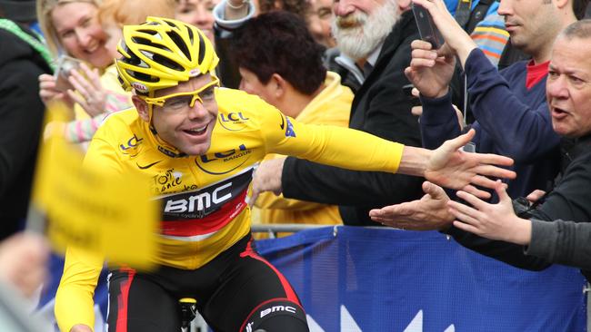 Tour de France winner Cadel Evans is welcomed home to Australia during a victory parade down St Kilda Road in 2011. Picture: AAP Image/David Crosling