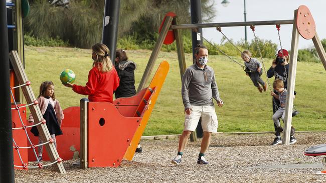 Families enjoy a day at the playground after restrictions lifted. Picture: Daniel Pockett/Getty Images