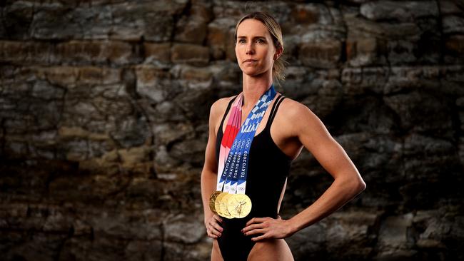 Emma McKeon with the four gold medals she won at the Tokyo Olympics.