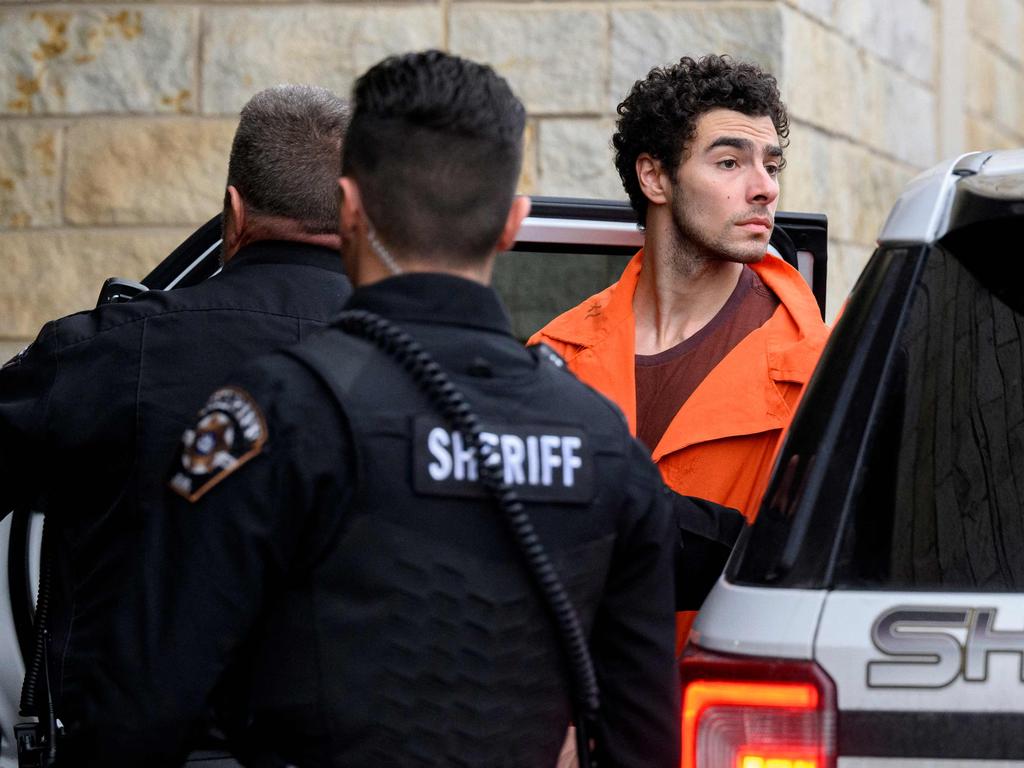 Luigi Mangione is led into the Blair County Courthouse for an extradition hearing December 10, 2024 in Hollidaysburg, Pennsylvania. Picture: Jeff Swensen/Getty Images/AFP