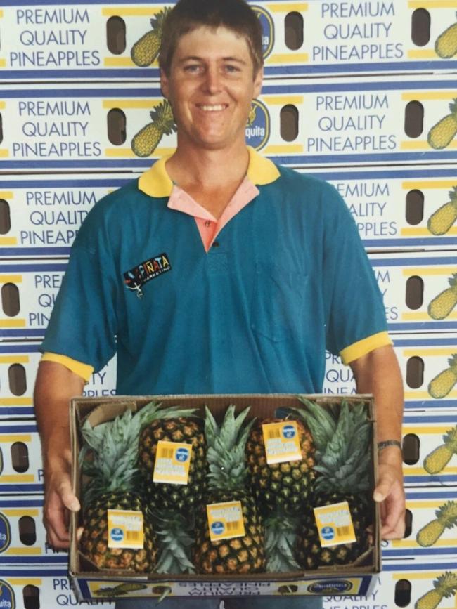 Gavin Scurr, managing director of Pinata Farms, with some pineapples circa 1994.