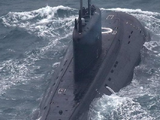 A view, taken by a Royal Navy helicopter, of an Improved Kilo-class submarine as it moved through the English Channel. Picture: Royal Navy