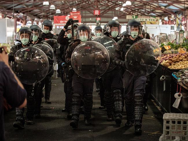 MELBOURNE, AUSTRALIA - SEPTEMBER 13: A heavy police presence is seen at the Queen Victoria Market on September 13, 2020 in Melbourne, Australia. Anti-lockdown protesters organised a "freedom walk" to demonstrate against Melbourne's current Stage 4 COVID-19 restrictions. While organisers claim the gathering is legal, Victoria Police said they would be monitoring protest activity, with anyone considered to be breaching the Chief Health Officer's directives liable for a fine of $1652. Metropolitan Melbourne remains under stage 4 lockdown restrictions, with people only allowed to leave home to give or receive care, shopping for food and essential items, daily exercise and work while an overnight curfew from 8pm to 5am is also in place. The majority of retail businesses are also closed. Other Victorian regions are in stage 3 lockdown. The restrictions, which came into effect from 2 August, were introduced by the Victorian government as health authorities work to reduce community COVID-19 transmissions across the state. (Photo by Darrian Traynor/Getty Images)