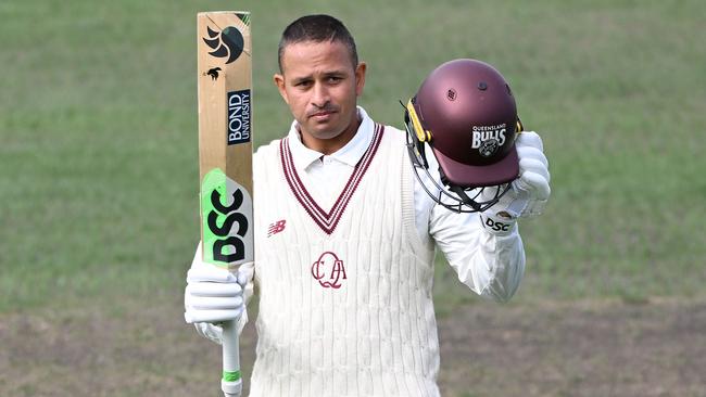 HOBART, AUSTRALIA - MARCH 06: Usman Khawaja of Queensland celebrates scoring a century during the Sheffield Shield match between Tasmania Tigers and Queensland Bulls at Blundstone Arena, on March 06, 2025, in Hobart, Australia. (Photo by Steve Bell/Getty Images)