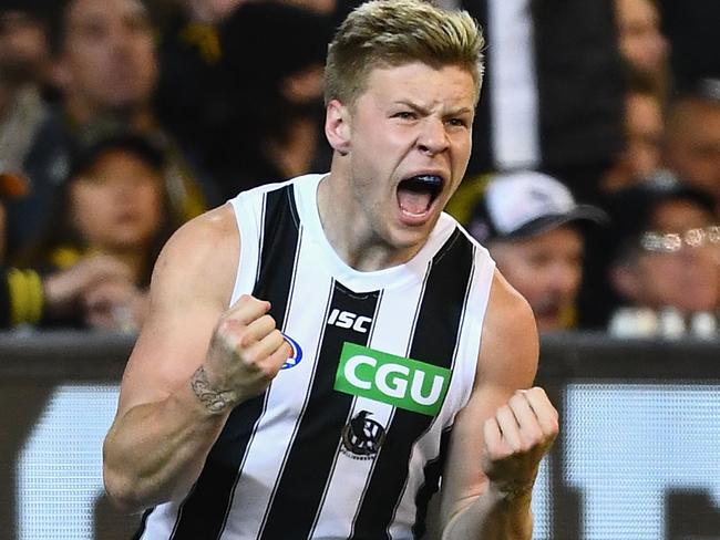 MELBOURNE, AUSTRALIA - SEPTEMBER 21:  Jordan De Goey of the Magpies celebrates kicking a goal during the AFL Preliminary Final match between the Richmond Tigers and the Collingwood Magpies on September 21, 2018 in Melbourne, Australia.  (Photo by Quinn Rooney/Getty Images)