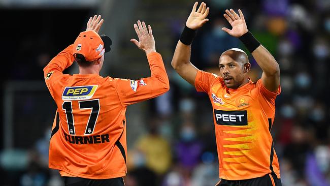 Tymal Mills celebrates the wicket of Ben McDermott at Blundstone Arena. Picture: Steve Bell/Getty Images