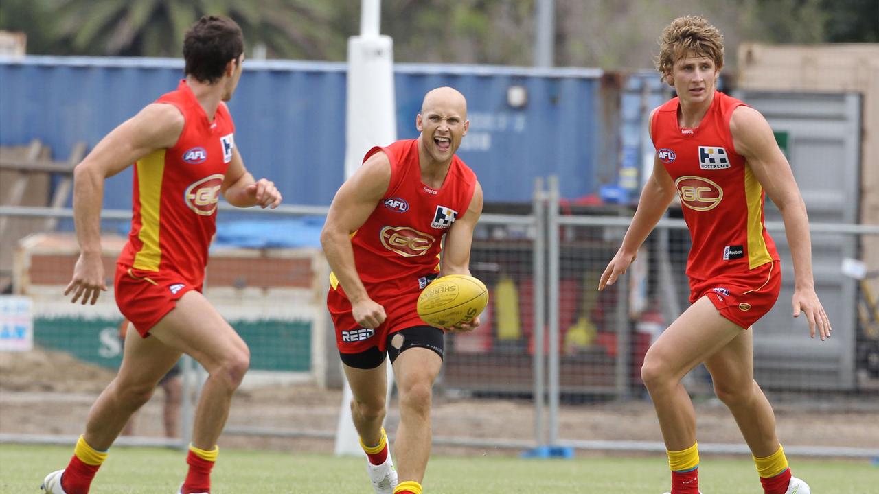 Daniel Gorringe (right) training alongside Michael Rischitelli and Gary Ablett Jr.