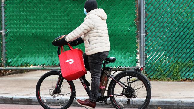 Silicon Valley online food delivery behemoth DoorDash has paid out a $2m fine for breaching Australia’s spam rules. Picture: Michael M. Santiago / AFP)