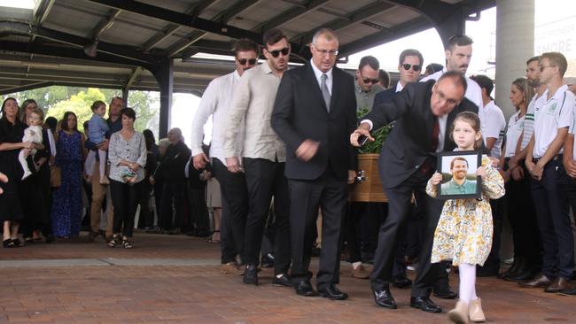 RESPECT: More than 500 people attended a service for Cameron Rodney Hyde who passed away from cancer. His mates from South Lismore Celtics formed a guard of honour. Photo: Alison Paterson