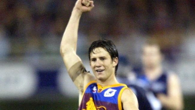 23/08/2003. Aaron Shattock celebrates. Brisbane Lions v Geelong at the Gabba.