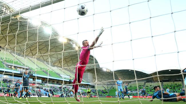 Sydney FC goalkeeper Andrew Redmayne is beaten by a shot from Jamie Maclaren of Melbourne City at AAMI Park. Picture: Getty Images