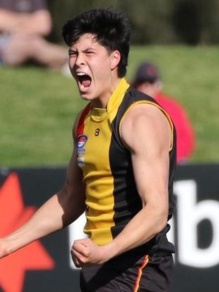 Josh Lai celebrates one of his two semi-final goals for Cheltenham last year. Picture: Andrew Keech.