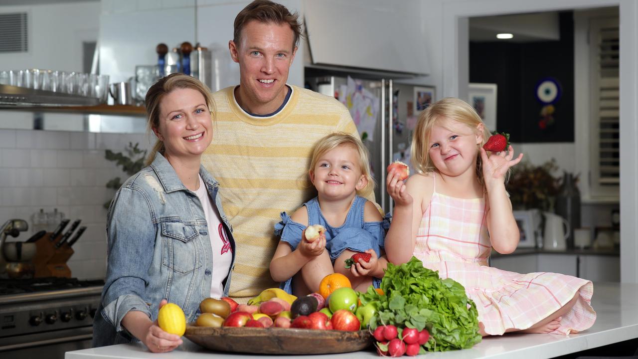 Emily and Trent Salkavich with their daughters Ella, 3, and Annabel, 6. Picture: Christian Gilles.