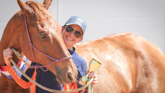 Champion show jumper Natalie Bell with her horse Warrego Waves at the Royal Darwin Show. Picture: Glenn Campbell