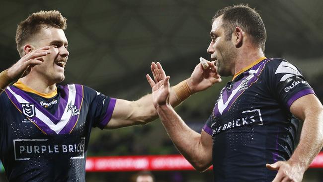 Ryan Papenhuyzen and skipper Cameron Smith celebrate another Storm win. Picture: Getty Images