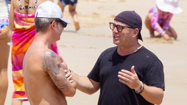 Michael Clarke and Karl Stefanovic at Noosa Main Beach. Picture: Matrix Media Group