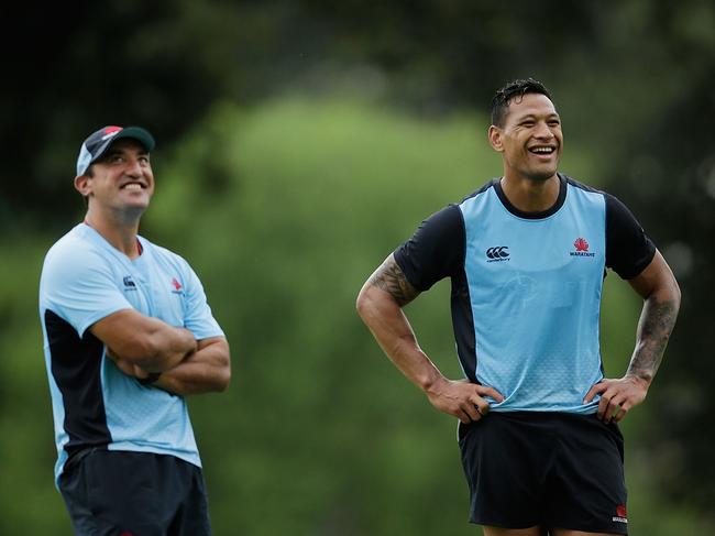 SYDNEY, AUSTRALIA - MARCH 15: Waratahs head coach Daryl Gibson and Israel Folau smile during the Waratahs Super Rugby training session at Kippax Lake on March 15, 2016 in Sydney, Australia. (Photo by Mark Metcalfe/Getty Images)