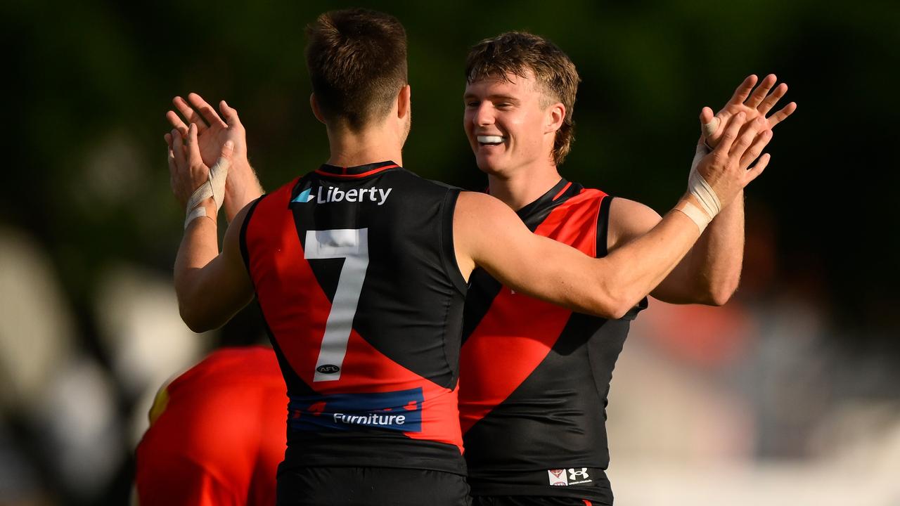 GOLD COAST, AUSTRALIA - FEBRUARY 23: Jye Menzie of the Saints celebrates kicking a goal during the AFL match simulation between Gold Coast Suns and Essendon Bombers at Austworld Centre Oval on February 23, 2023 in Gold Coast, Australia. (Photo by Matt Roberts/Getty Images)