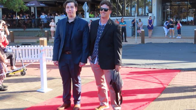 The students from Urangan State High School celebrating their formal.