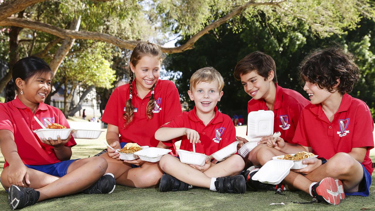 From left, Wulan Yuliantara, Michayla Penn, Tom Howatson, Lenny Miller and Bailey Gosbell eating healthy lunches supplied by Barzura at Coogee Public School. Picture: Justin Lloyd