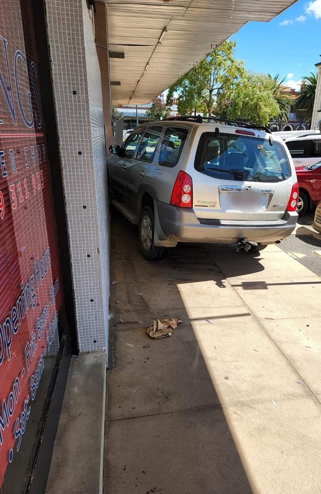 Visitors to a Warwick barber shop received the shock of a lifetime when a car smashed into the shop front.