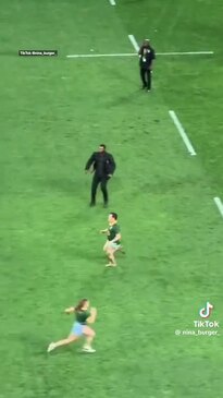 Pitch invader knocked out cold in brutal hit