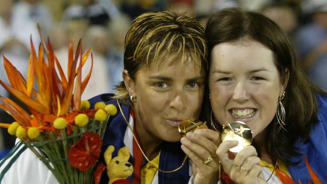 Karen Murphy (left) is victorious alongside teammate Lynsey Armitage at the 2006 Melbourne Commonwealth Games