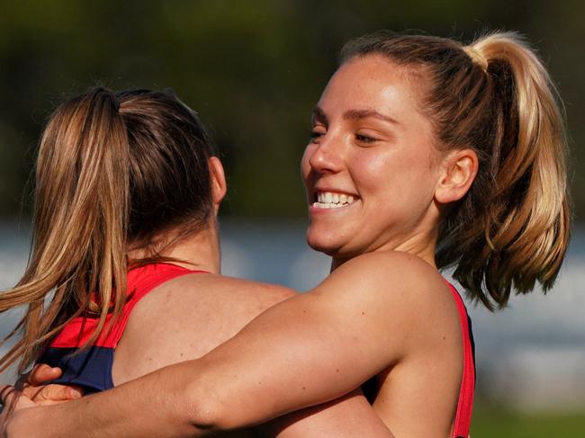 Melbourne winger Eliza McNamara has returned to footy little over a year since a serious spinal fracture threatened her future in the game. Picture: Melbourne FC