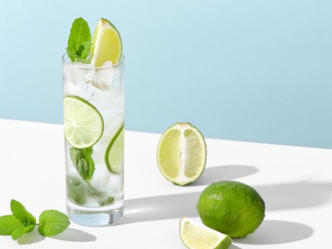 Lime and soda water is a healthier alternative to alcohol. Consistent alcohol consumption can lead to weight gain, belly fat and health problems. Picture: istock