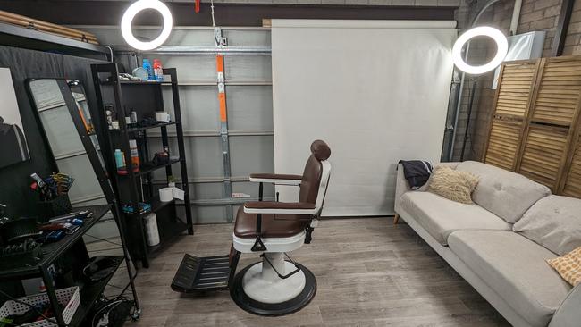 Joel Verdouw transformed his parents' garage into his barbershop studio. Picture: Tom McGann.