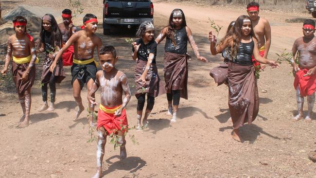 A group of 14 boys and girls aged between eight and 13 went through a final traditional dance rehearsal behind the store before performing before the appreciative crowd.