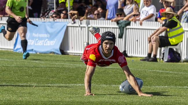 Chris Woodbridge scores a try during the men’s Koori Knockout grand final. Picture: Andrea Francolini