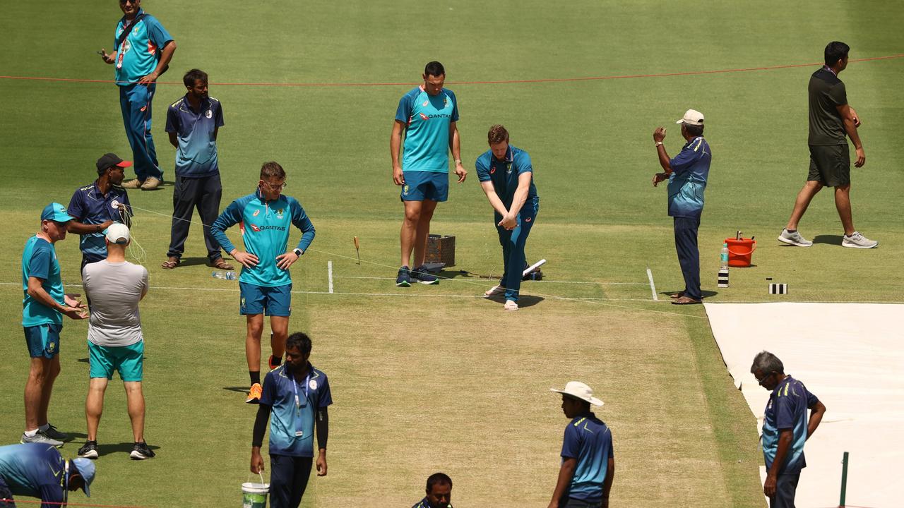 Steve Smith, Scott Boland and Todd Murphy inspect the pitch prior to an Australia Test squad training session at Narendra Modi Stadium on March 08, 2023 in Ahmedabad, India. (Photo by Robert Cianflone/Getty Images)