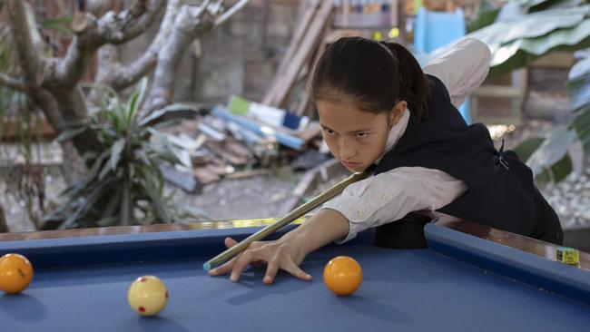 Lilly Meldrum, 11, has just come back from the world under 16 snooker titles where she came fourth. She is the Australian under 18 champion. Picture: Russell Shakespeare