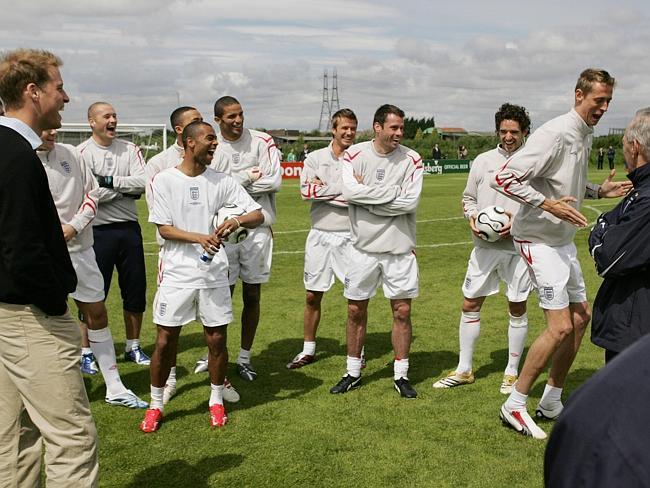 Despite his famous robot celebration — demonstrated here for Prince William and his 2006 World Cup colleagues — England’s Peter Crouch (far right) is not actually a robot footballer. Picture: Grant Turner.