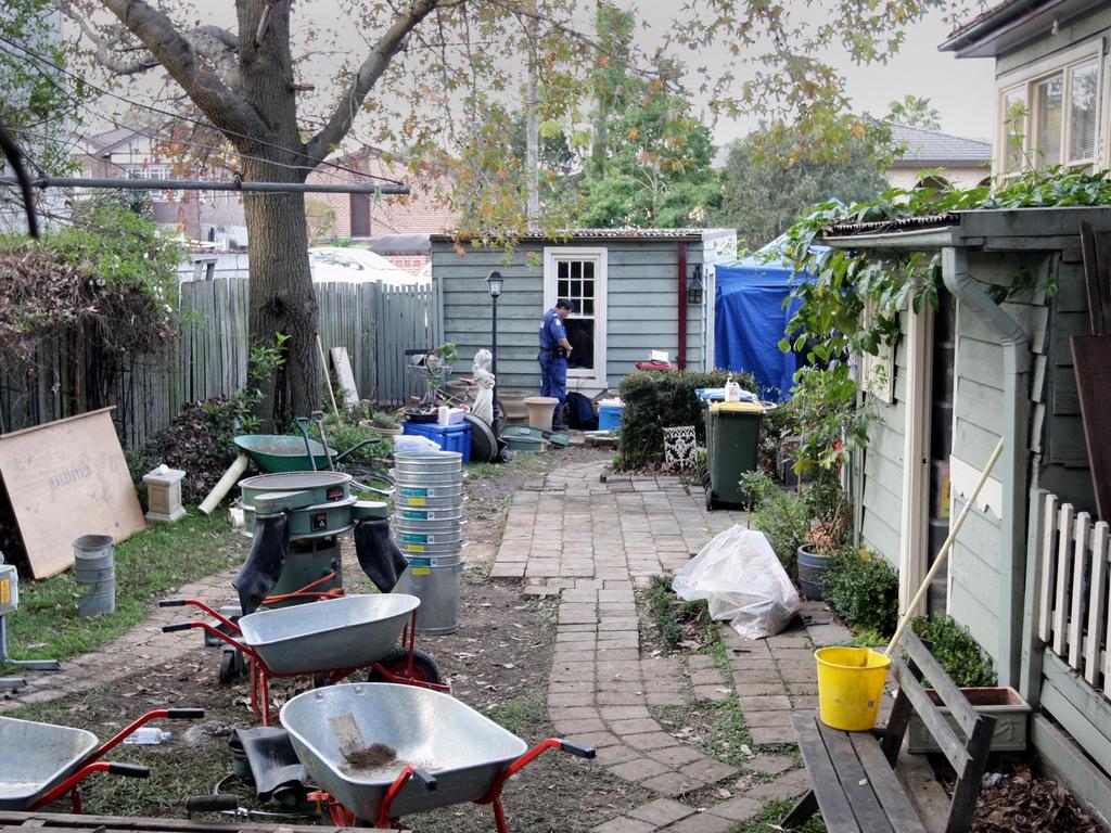 Police search Lane’s Gladesville backyard for traces of baby Tegan.